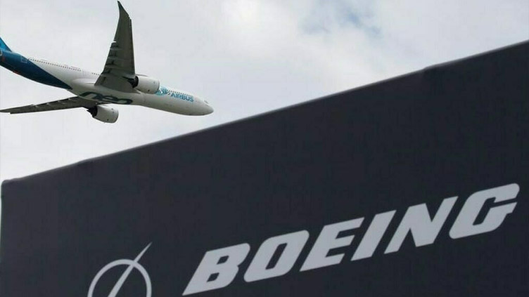 Boeing says it will cut about 2,000 white-collar jobs in finance and HR