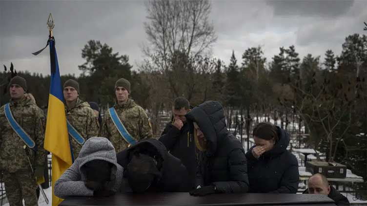 Russian shells spark hospital fire before expected assault