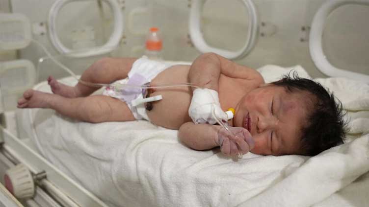 Syrian newborn pulled alive from quake rubble