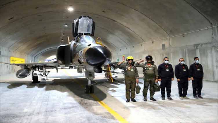 Iran reveals an underground air force base, IRNA says