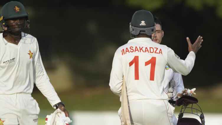 Zimbabwe hold off late West Indies charge to draw first test