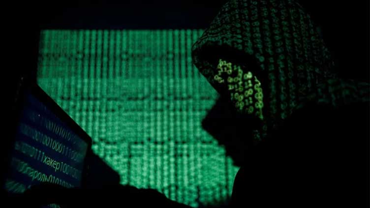 Britain sanctions seven Russians over cyber crime