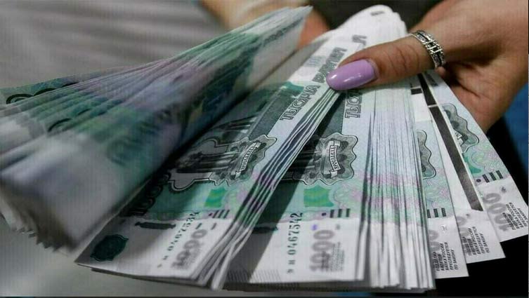 Russian rouble holds near nine-month lows