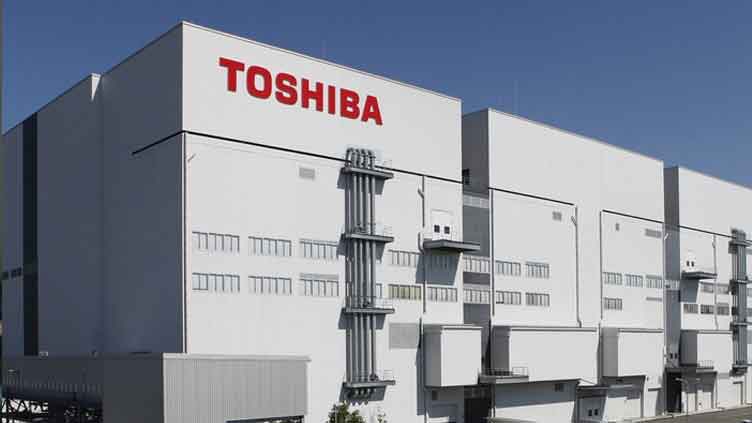 Toshiba slashes full-year profit estimate, COO resigns