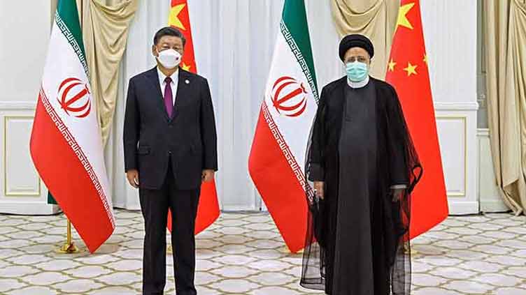 China, Iran call for Iran sanctions to be lifted; Xi to visit