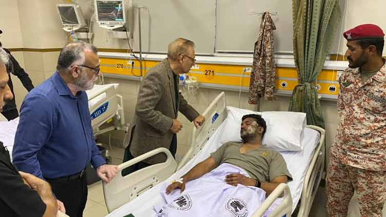 President Alvi visits injured personnel of Karachi Police Office attack 