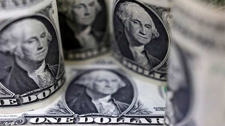 Dollar buoyant as robust US data keep Fed hawks in control