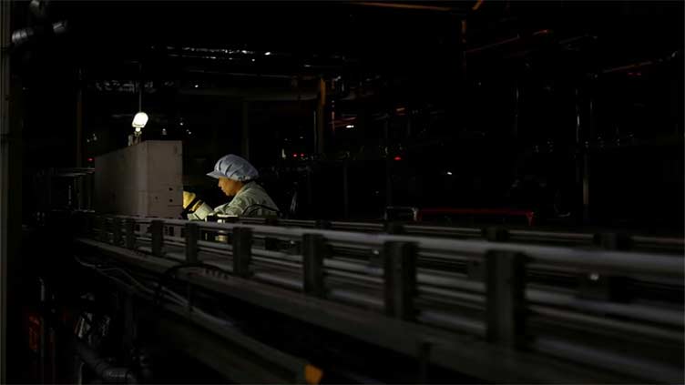 Japan's factory activity shrinks at fastest pace in 2-1/2 years