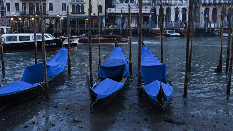  Venice gondolas beached by low tides