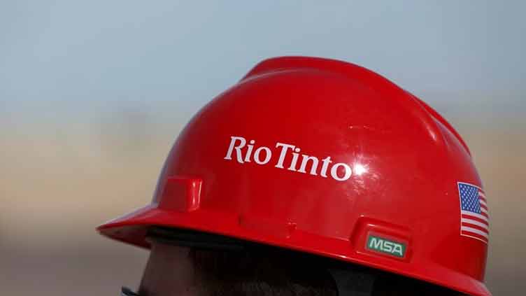 Rio Tinto slashes dividend as profit plunges on slower China demand