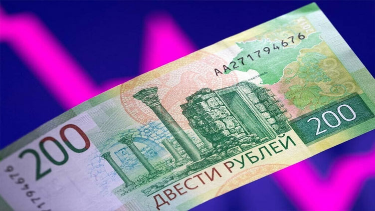 Russian rouble fights imminent new sanctions threat to strengthen