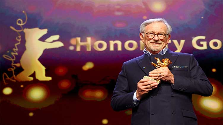 Still filming, Spielberg, 76, wins Berlin lifetime award