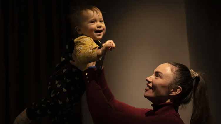 Joy amid sorrow: First birthdays muted for Ukrainian parents