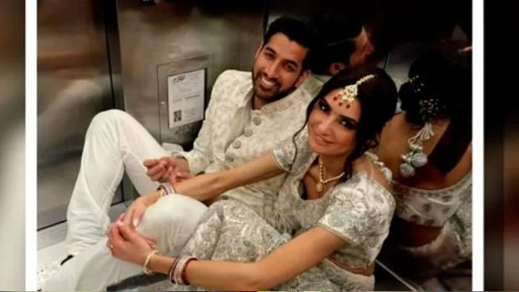 Newlywed couple spends wedding day in elevator 