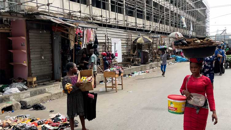  'Where is the money?' Inflation and cash crisis hit hard as Nigeria goes to the polls