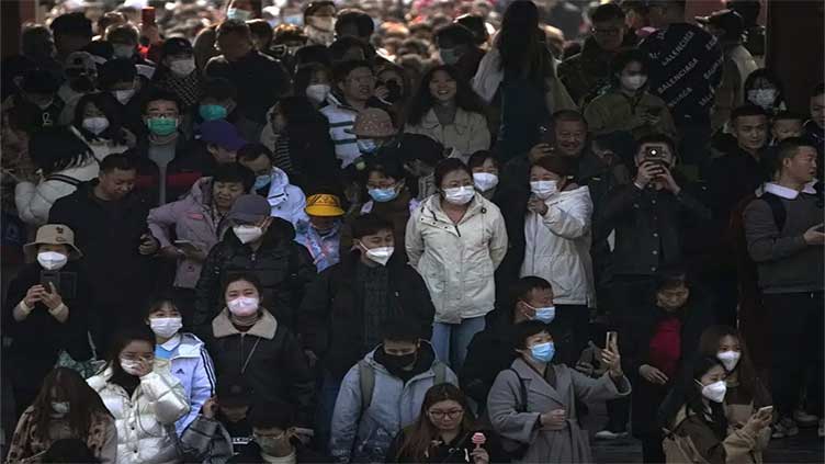 China says it's been 'open and transparent' on COVID origins