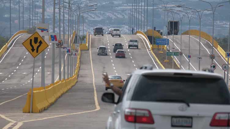 Colombia, Venezuela open key binational bridge as ties warm