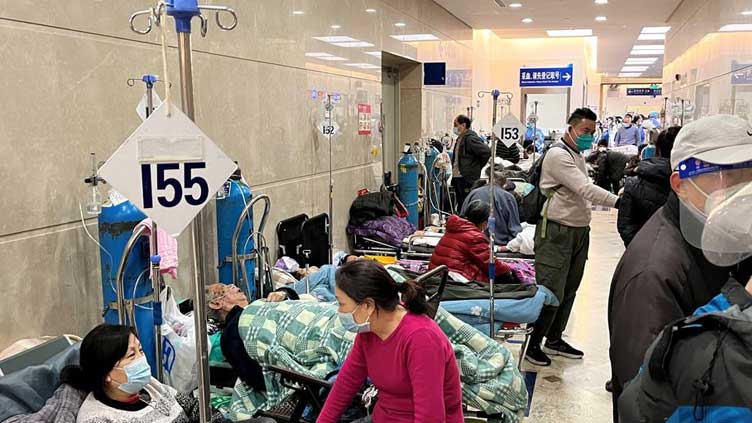  China media plays down COVID severity as WHO seeks detail on variants