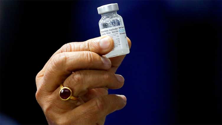 EU offers China free vaccines as COVID-19 infections surge