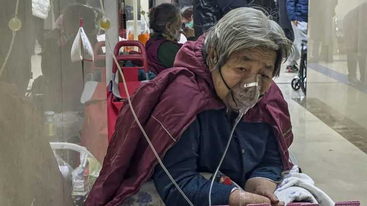  Beds run out at Beijing hospital as Covid spreads