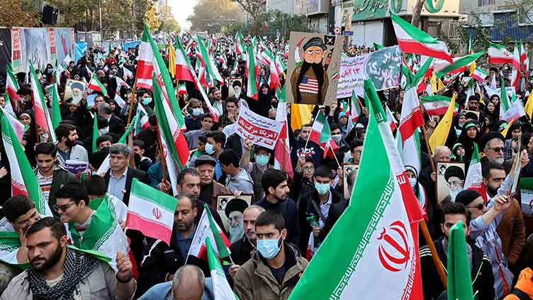 Iran hangs two men accused of killing security official during protests ...