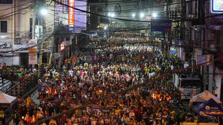  Filipino Catholics hold big procession after pandemic eases