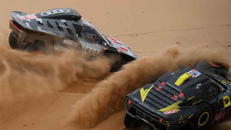 Loeb takes Dakar Rally stage after Sainz caught speeding