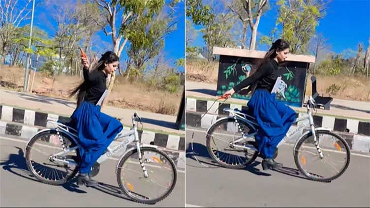 Woman skipping rope while riding a bicycle sparks uproar 