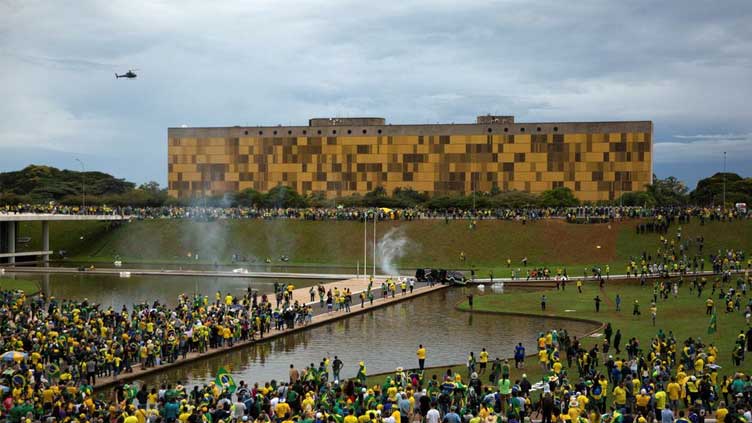  Brazil riot police deploy at Bolsonaro backers' camp after capital stormed