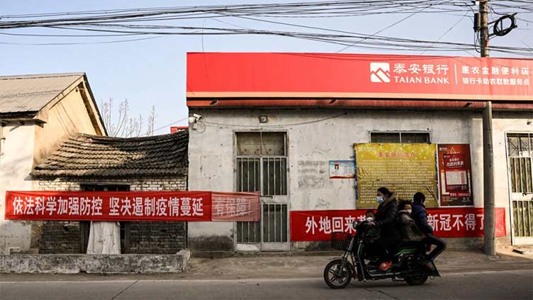 'Total mess' in China's rural east as Covid wave hits hard