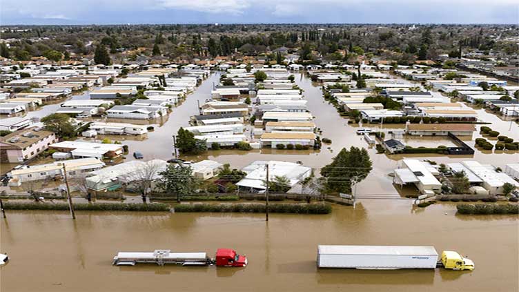 California is deluged by record rain with more storms coming