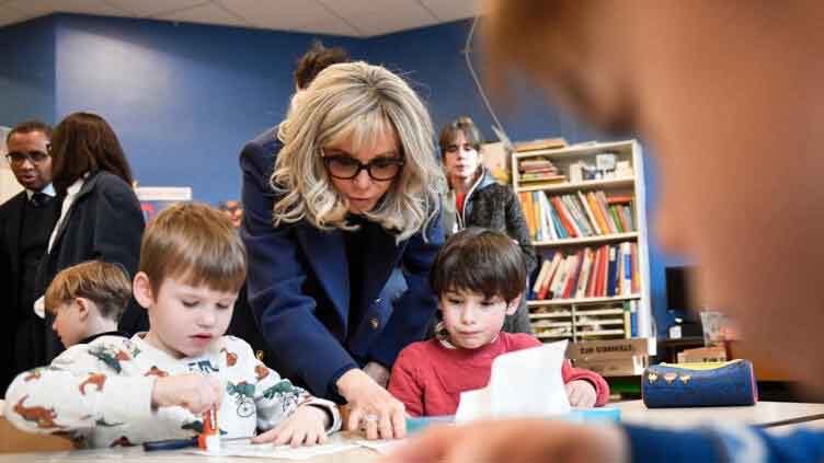 French first lady backs controversial school uniform