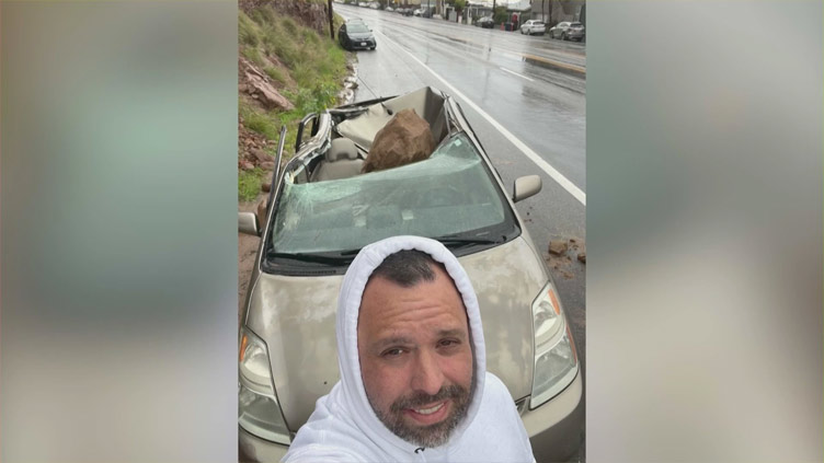 Boulder crushes California man's car moments after he got out