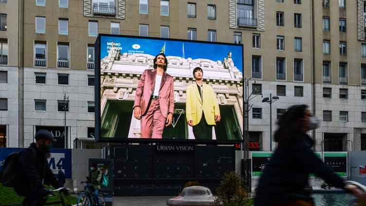 Men's fashion week goes live in Milan, buoyed by upbeat sales