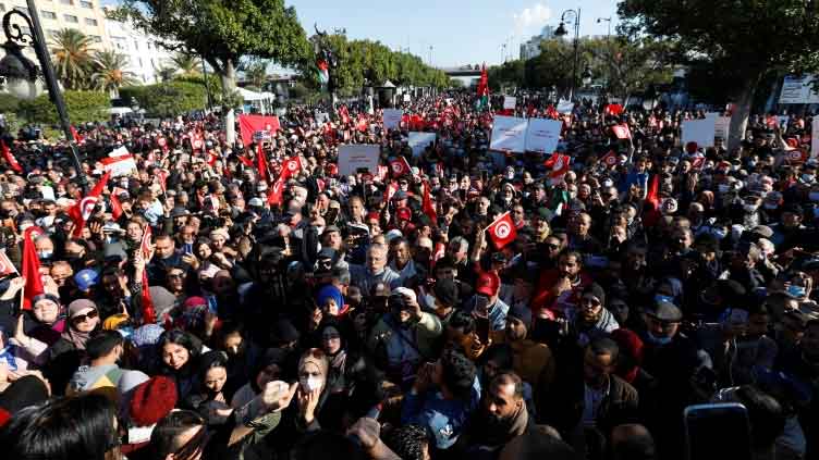 Thousands of Tunisians rally against president on revolution anniversary