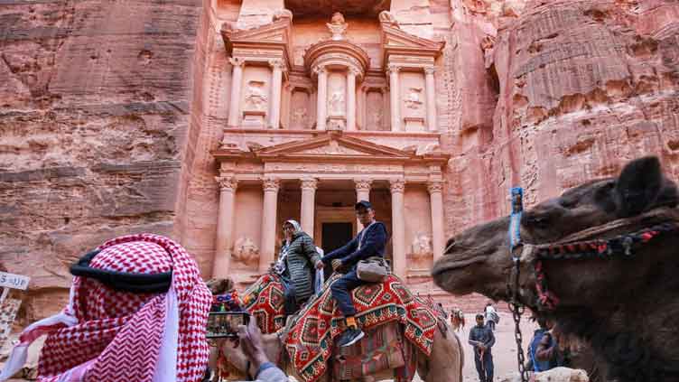 Tourists surge back to Jordan's desert marvel Petra