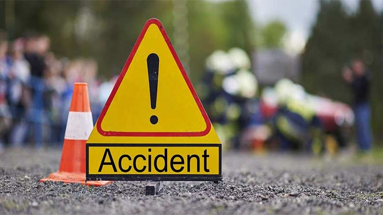 Two killed, four injured in bus-truck collision 