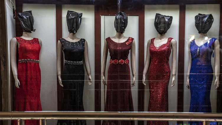 Kabul's mannequins, hooded and masked under Taliban rules
