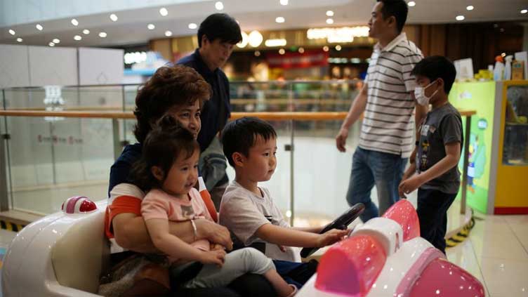 Make it easier to raise children, say many Chinese after population falls