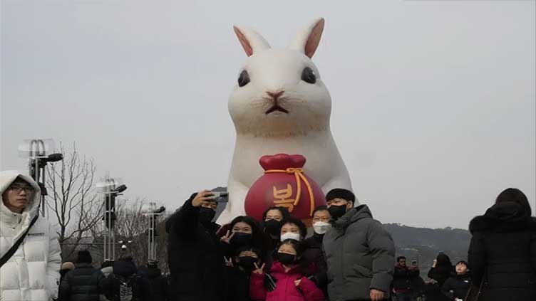 China rings in Year of Rabbit with most COVID rules lifted