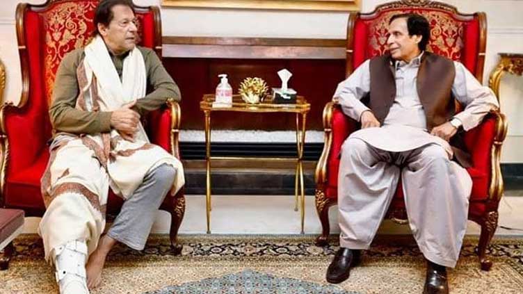 Pervaiz Elahi meets Imran Khan, discusses political situation