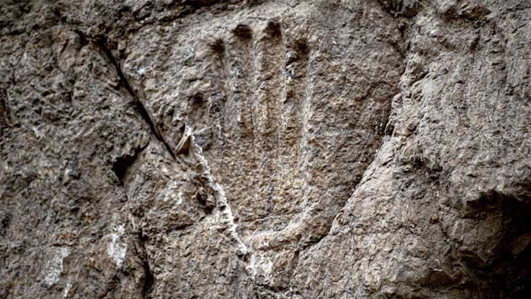  Ancient Jerusalem hand imprint baffles Israel experts