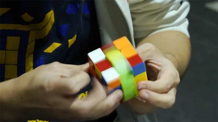 World champion says Rubik's Cube and violin go hand in hand