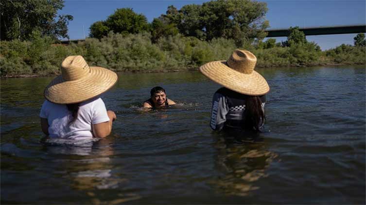 Half of Americans face stifling heat, poor air quality