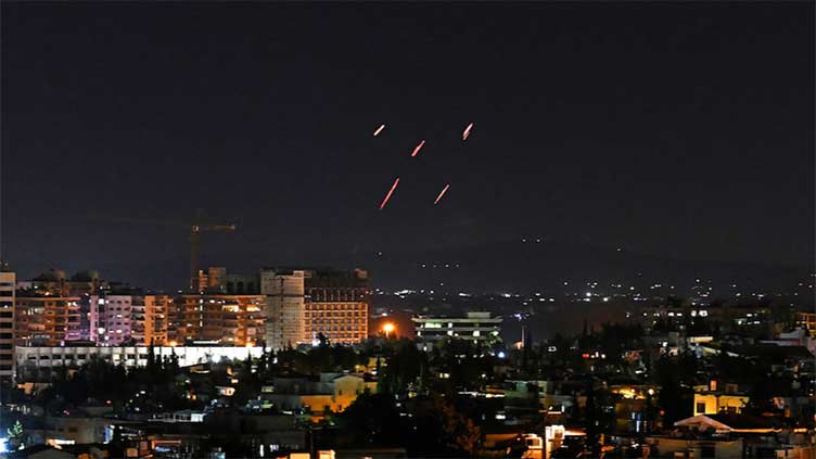 Syria says air defences intercept Israeli missile strike