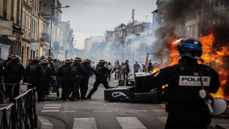 Hundreds arrested on fifth night of France unrest after teen laid to rest