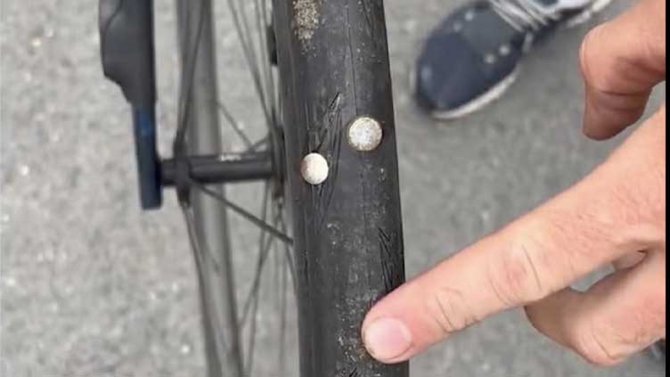 Nails on the road cause punctures in Tour stage finale