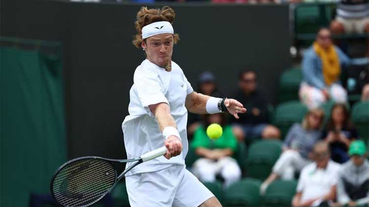 Rublev leads Russian return with easy win