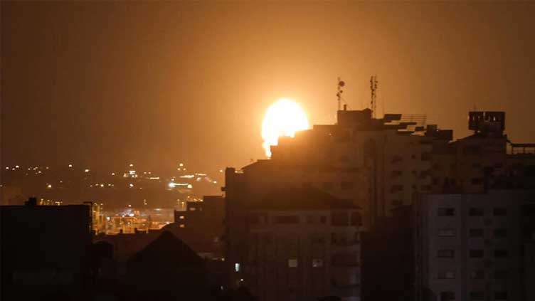 Israel strikes Gaza, 12 Palestinians, Israeli soldier killed in Jenin assault