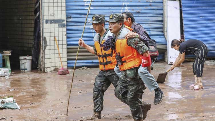 Torrential rains kill at least 15 in southwest China